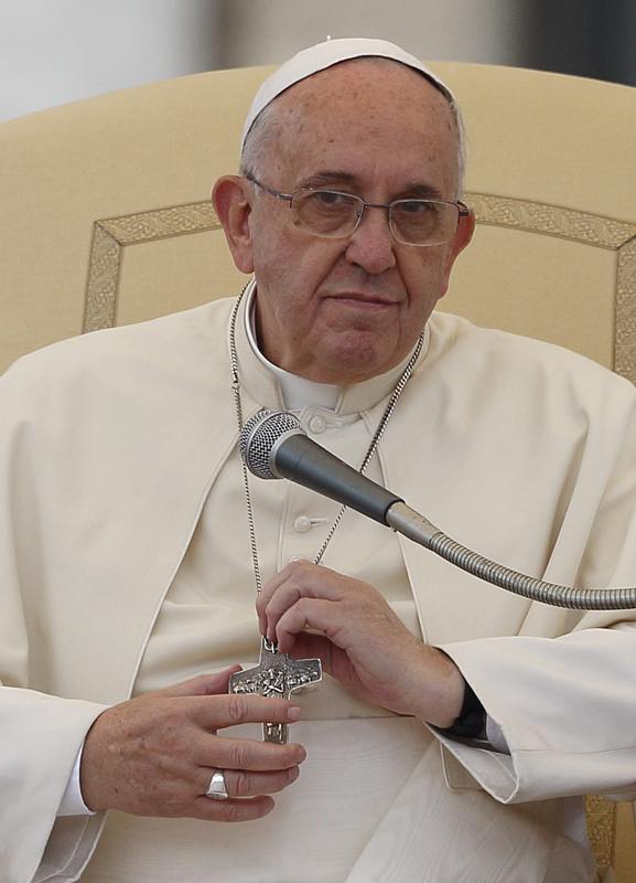 Pope Francis Holding Onto His Papal Pectoral Cross with a general audience