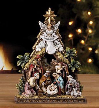 Colorful nativity scene with gloria angel and 3 kings